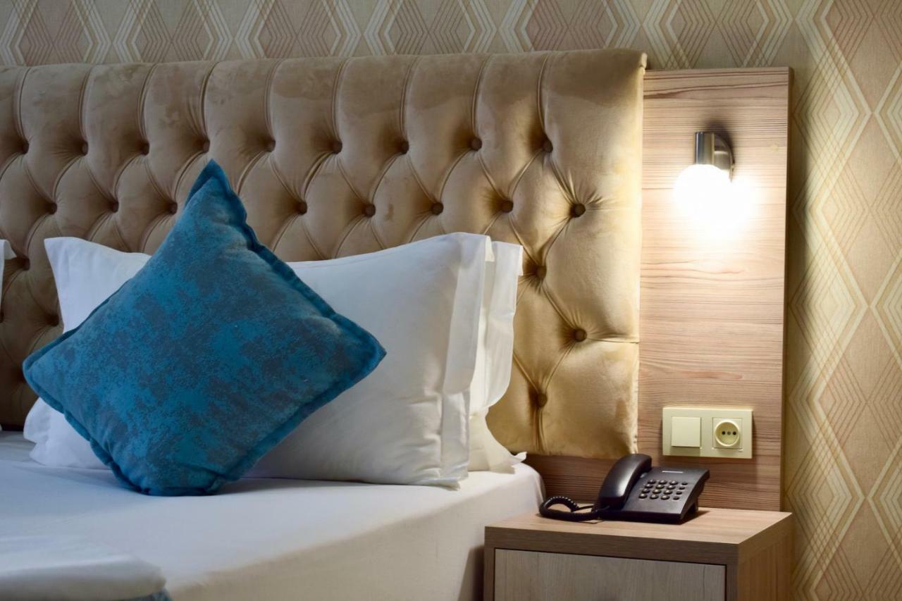 Dostar Inn Шимкент Екстериор снимка