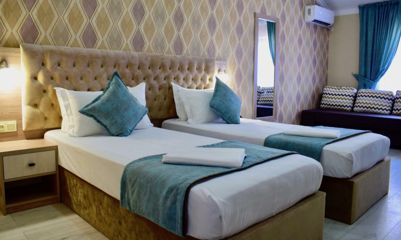 Dostar Inn Шимкент Екстериор снимка