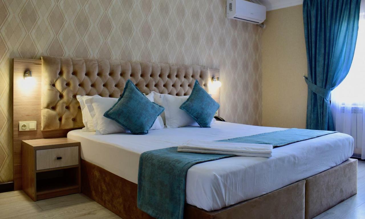 Dostar Inn Шимкент Екстериор снимка