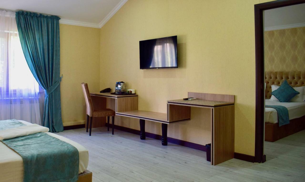 Dostar Inn Шимкент Екстериор снимка