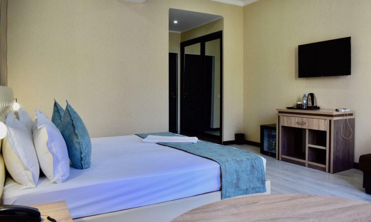 Dostar Inn Шимкент Екстериор снимка