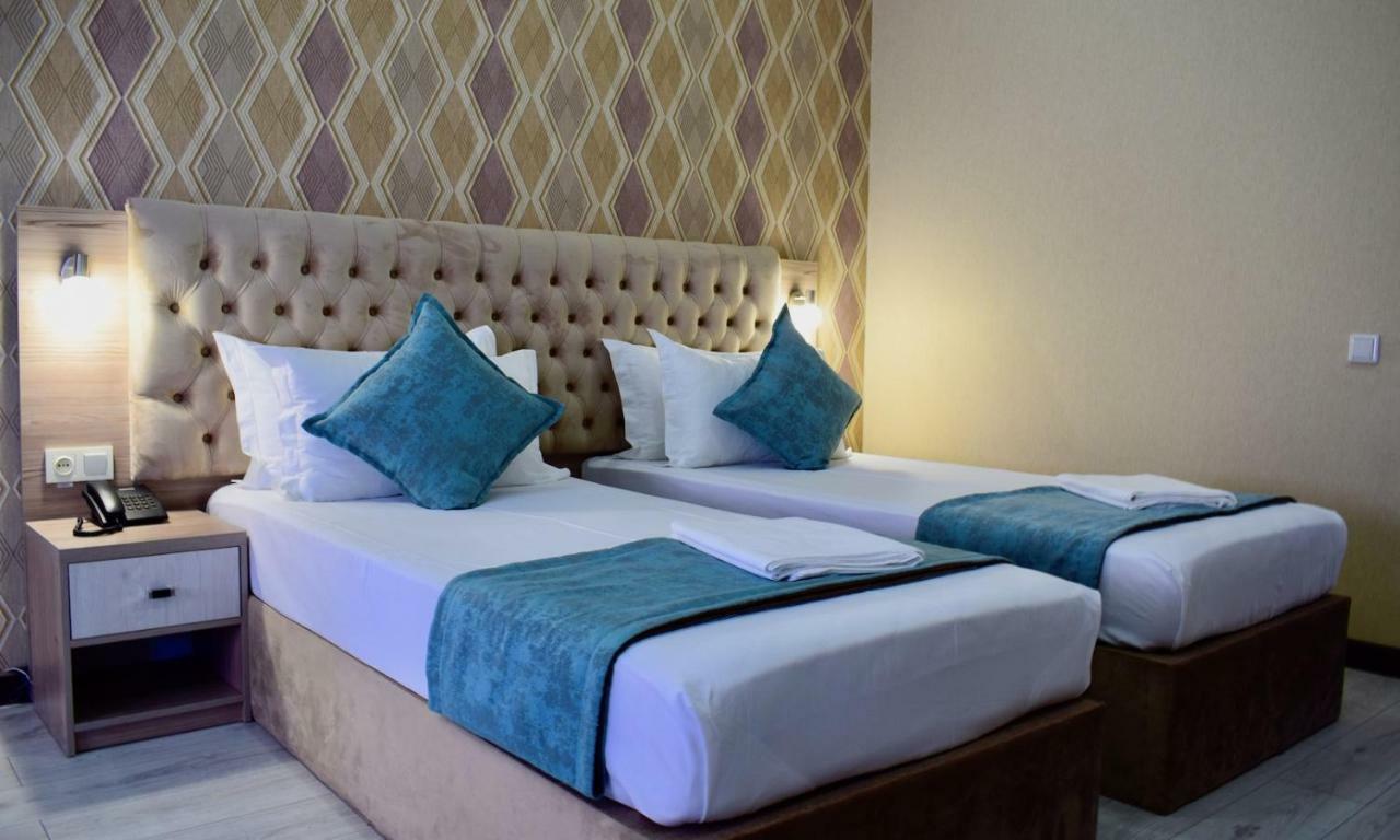 Dostar Inn Шимкент Екстериор снимка